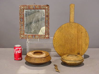 Primitive Lot: Primitive lot including: (2) wooden turned seed boxes (largest 9" D.), folk art painted frame with mirror (11" x 10 1/2"), breadboard with knife (overall 19 1/2/" L.).