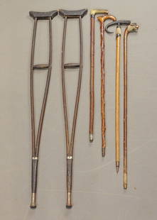 Cane Lot: Lot of various canes including figural dog, along with early crutches.