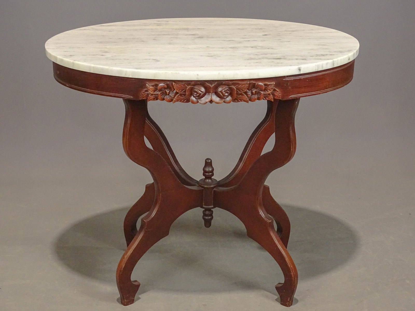Oval Marble Top Table: Oval marble top table. 33 1/2" x 22".
