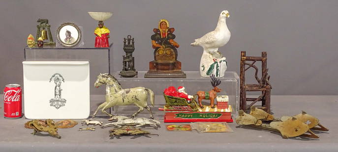 Collectibles Lot: Collectibles lot: chalkware dove, figural tin match safe, doll size Adirondack twig chair, carved wooden Indian medallions, cast iron bear match safe, "San Diego" 1915 bell, cast iron pin holder, 2 pl