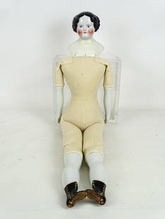 Porcelain Head Doll: Large doll with soft body and porcelain head, legs and arms. Head not attached. 31" L..