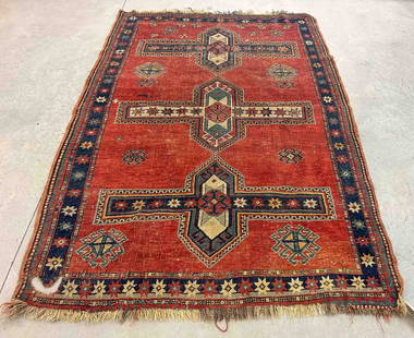 Oriental Rug: Oriental rug. 57" x 80". As found, hole in one end.