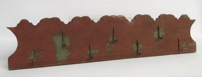 Hook Rack: Early wooden hook rack in red paint. 38 1/2" x 19".