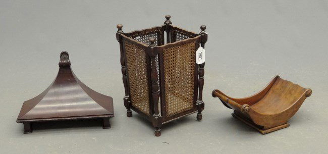 Misc. Lot: Misc. lot including caned waste basket, mahogany shelf and wooden carved center bowl.