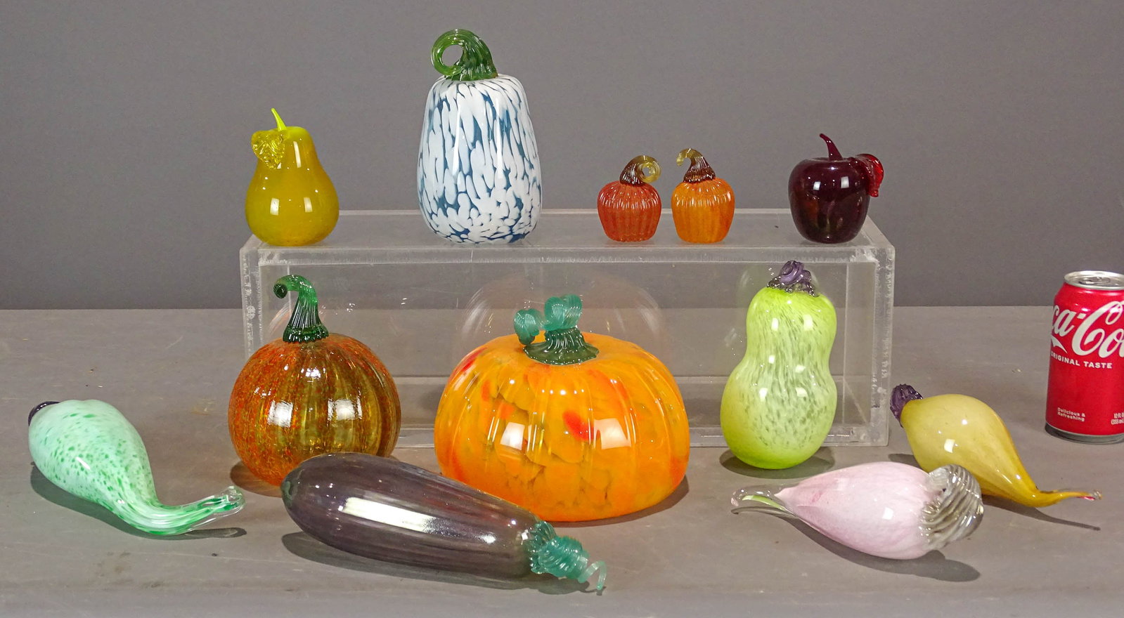 Art Glass Lot: Lot (12) pieces of art glass vegetables. Largest 6" D., 12" Ht..