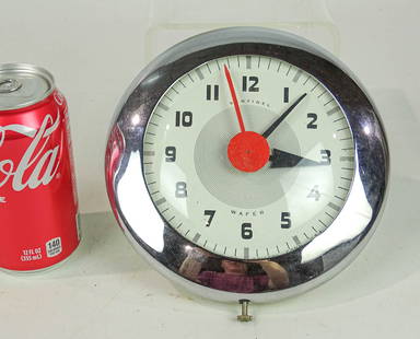 Vintage Clock: C. 1940 Henry Dreyfuss "Sentinel Wafer" clock. Model SK174. Working condition. 7" D..