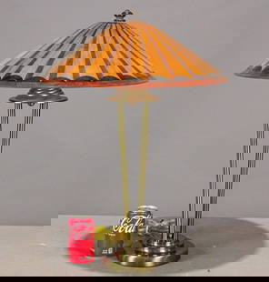 Table Lamp: Table lamp with four canted columns and copper color glass shade. 25" Ht.