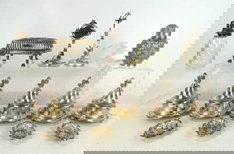 Silver Lot: Silver plate and sterling lot: (5) condiment containers (engraved "Pineapple", "Vanilla", "Chocolate", "Strawberry", "Orange", 5 1/2" Ht.), glass sugar shaker with sterling top (7" Ht."), (4) sterling