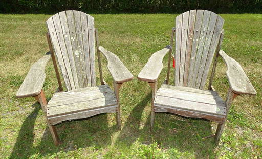 Teak Adirondack Chairs: Pair of teak Adirondack chairs.