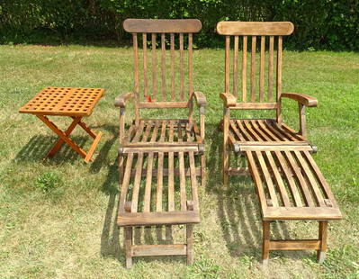 Pair Teak Lounge Chairs: Pair of teak lounge chairs with brass hardware and folding side table.