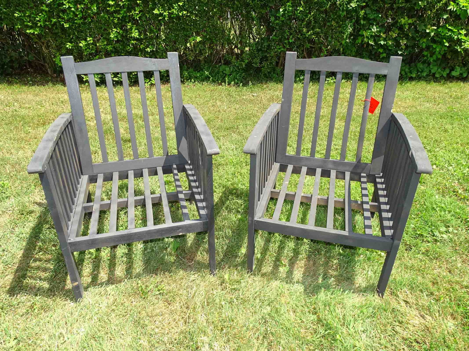 Pair of Black Wooden Chairs: Pair of black wooden chairs. 12" seat Ht..