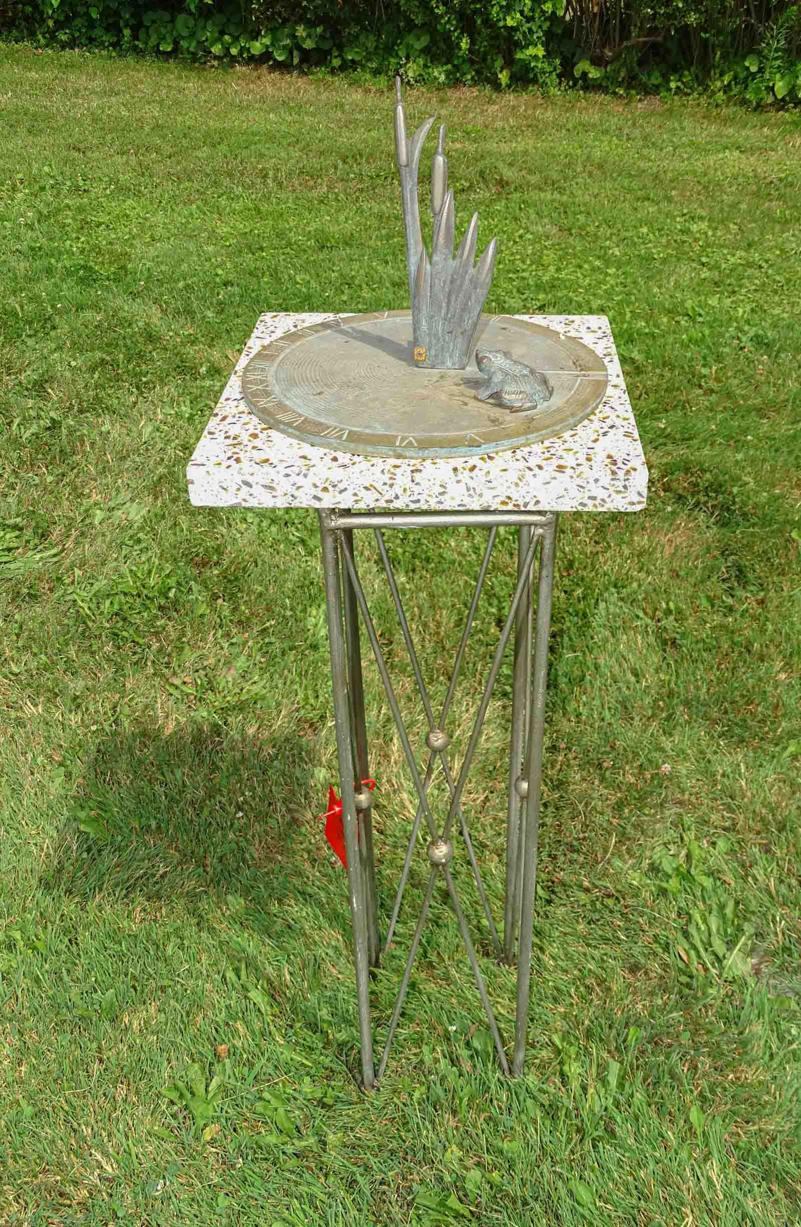 Sundial: Frog and cattails Sundial on granite and metal base. 31" base Ht..