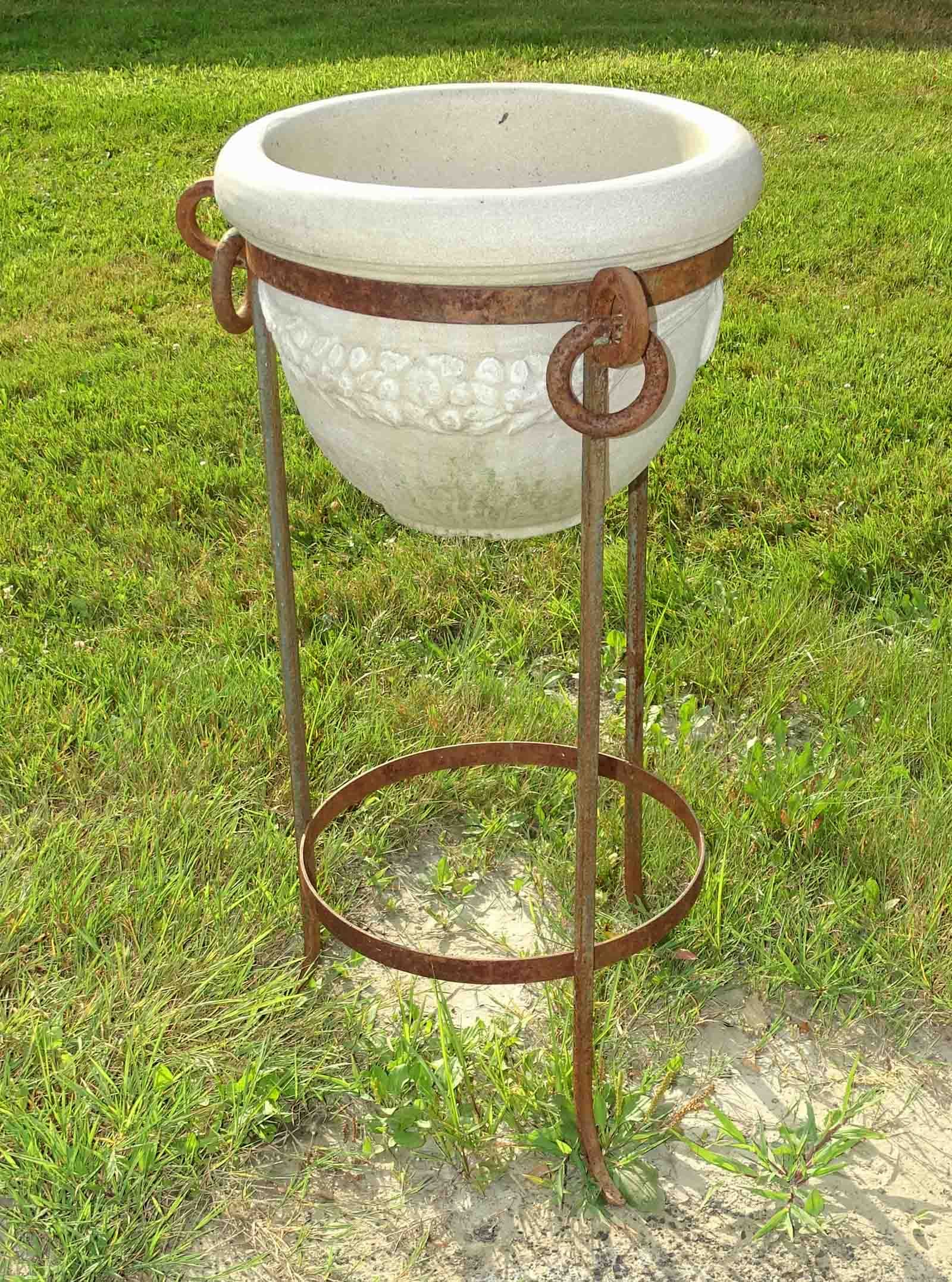 Metal Base Planter: Metal based planter with resin pot. 33" Ht., 16" D..