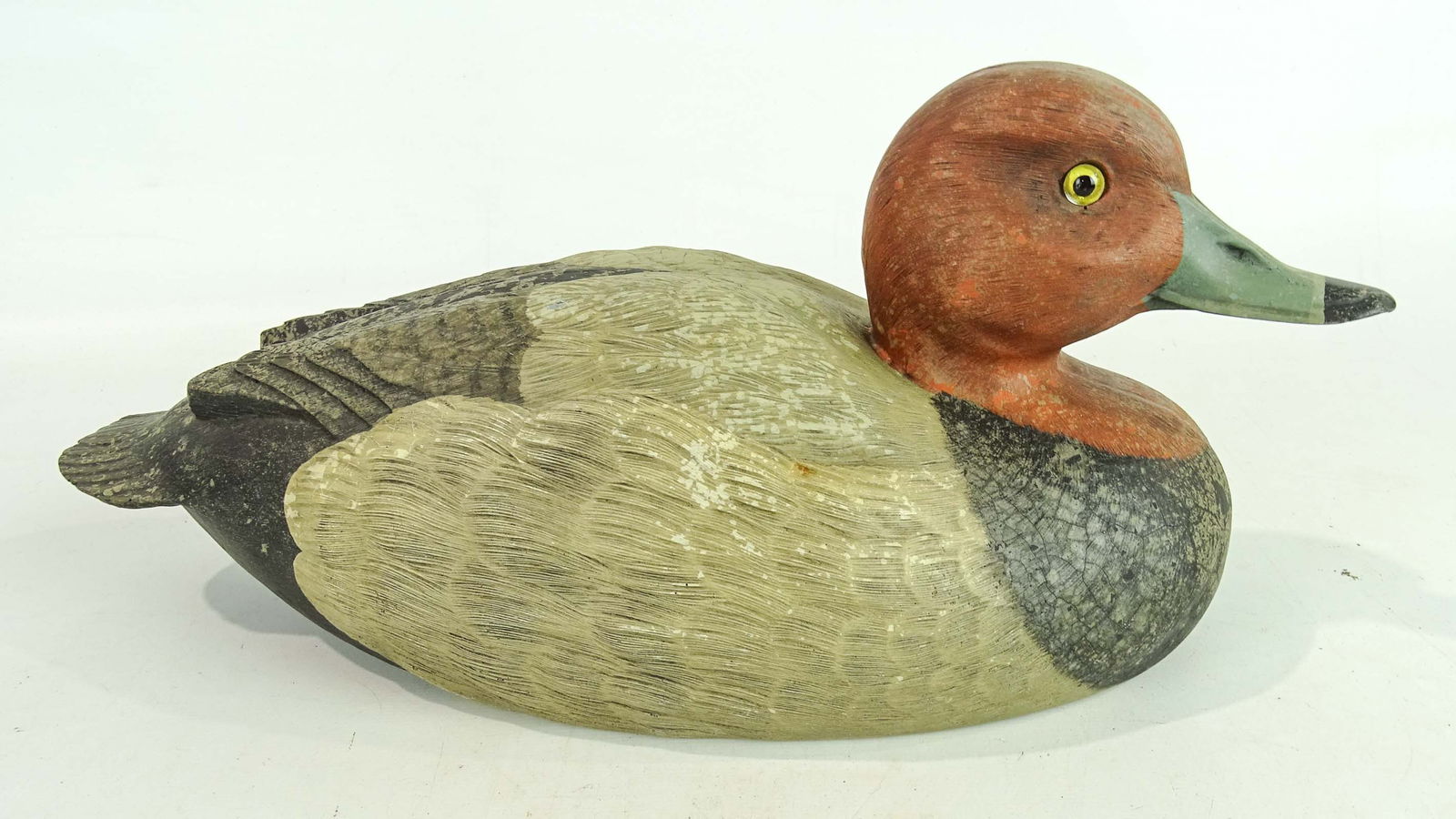 Duck Decoy: Hollow composition duck decoy marked underside "CC-3-14". 13" L..