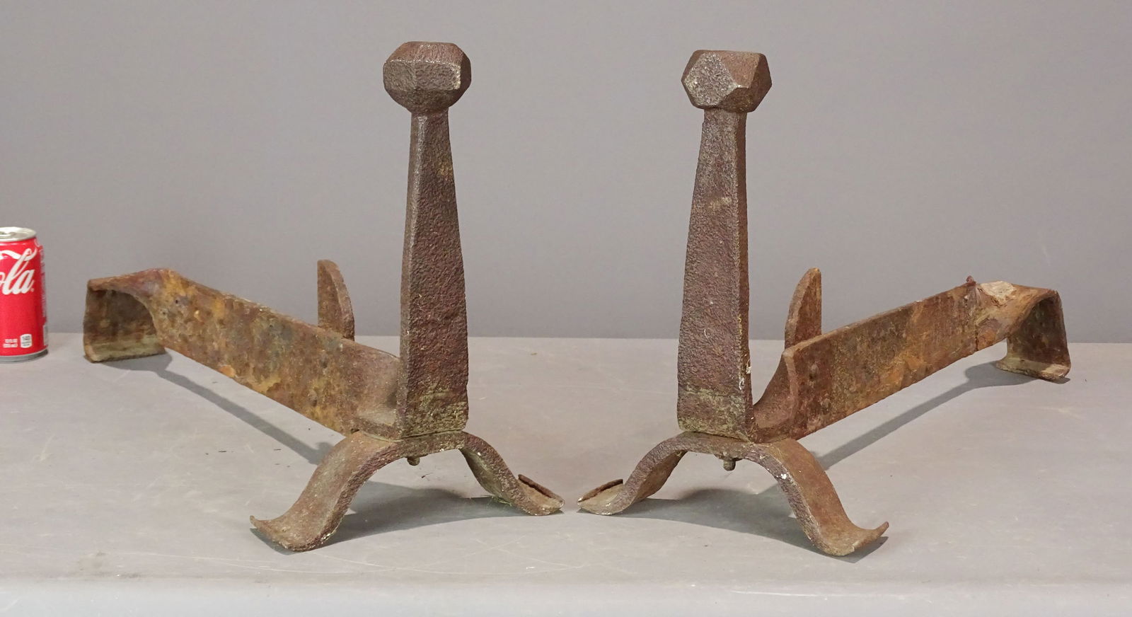 Andirons: Pair of cast iron Art Brute type andirons. 14" Ht., 26" L..