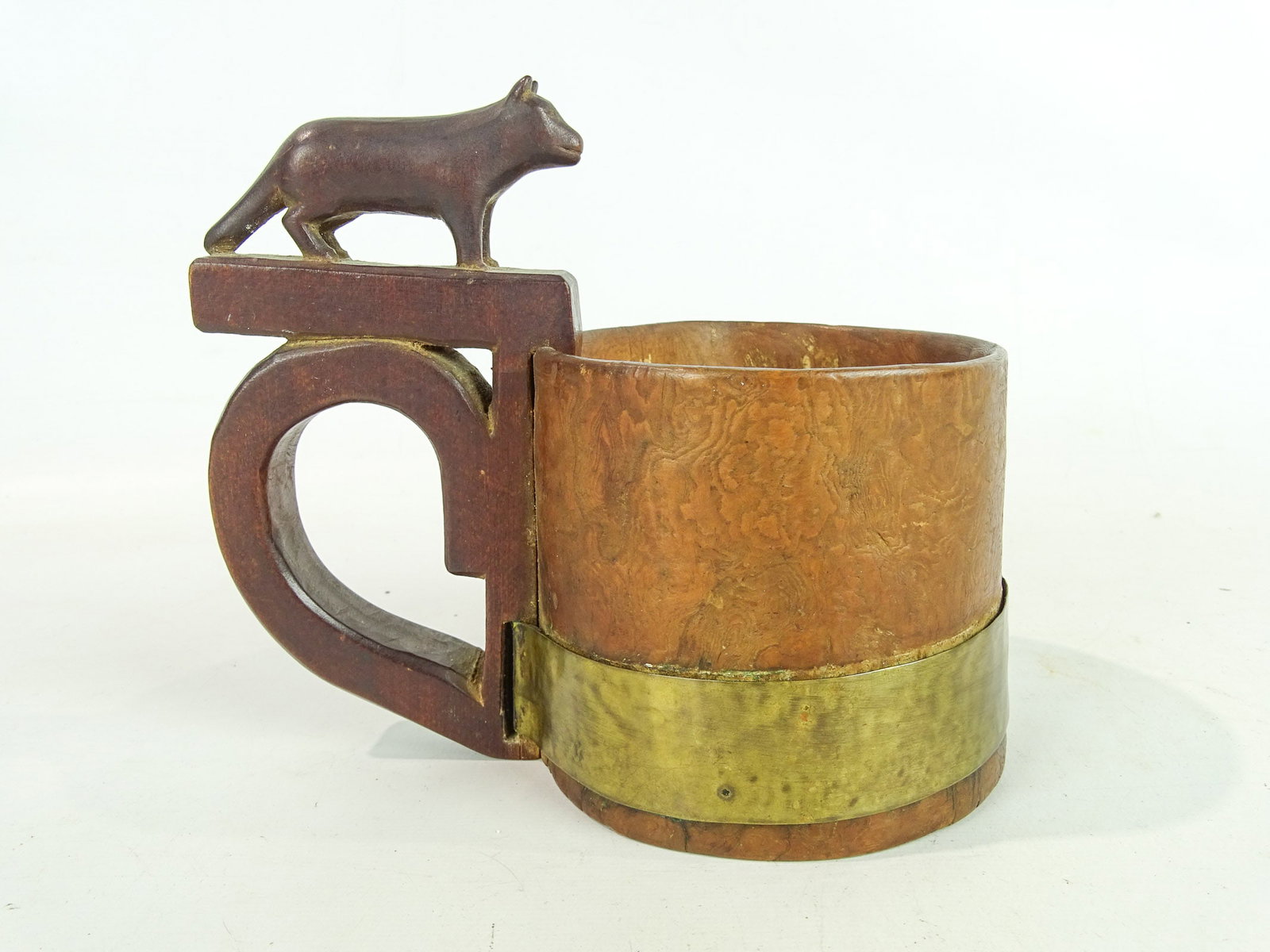 Effigy Mug: Early Wolf Effigy burl mug with brass. 7" x 5" x 7" Ht..