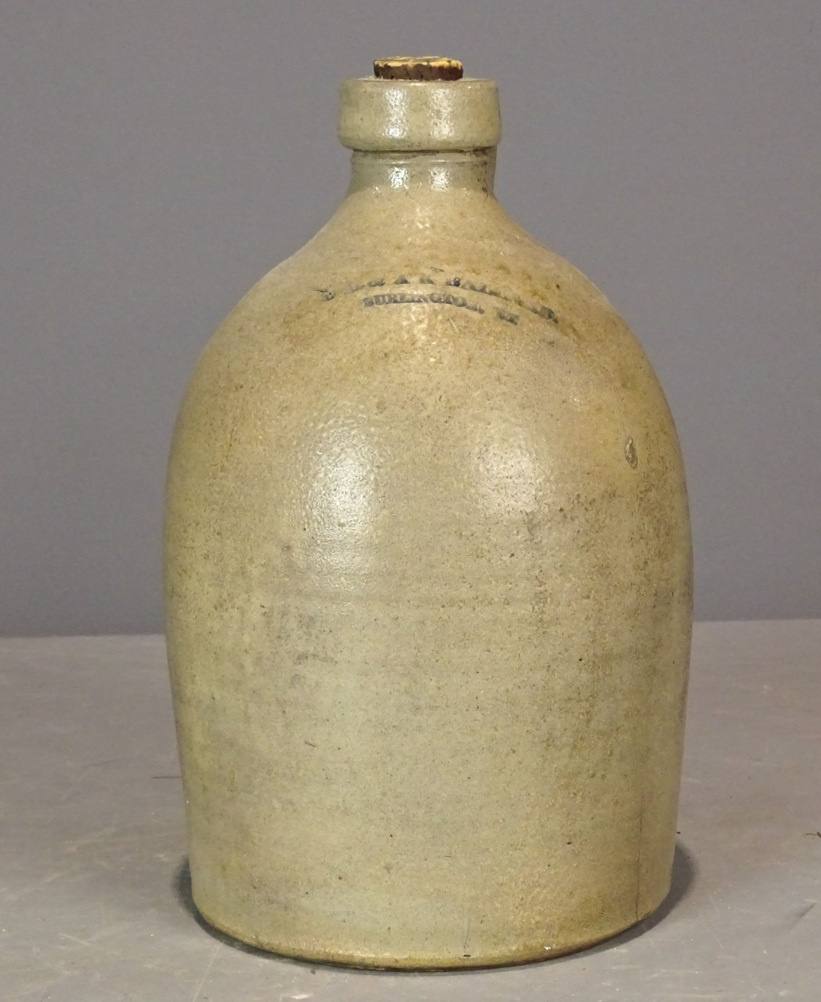 Stoneware Jug: Burlington VT. Stoneware jug