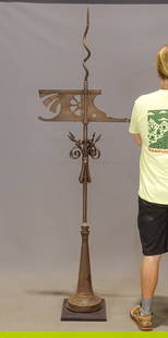 Weathervane: 19th century wrought iron banner weathervane. 80" Ht.