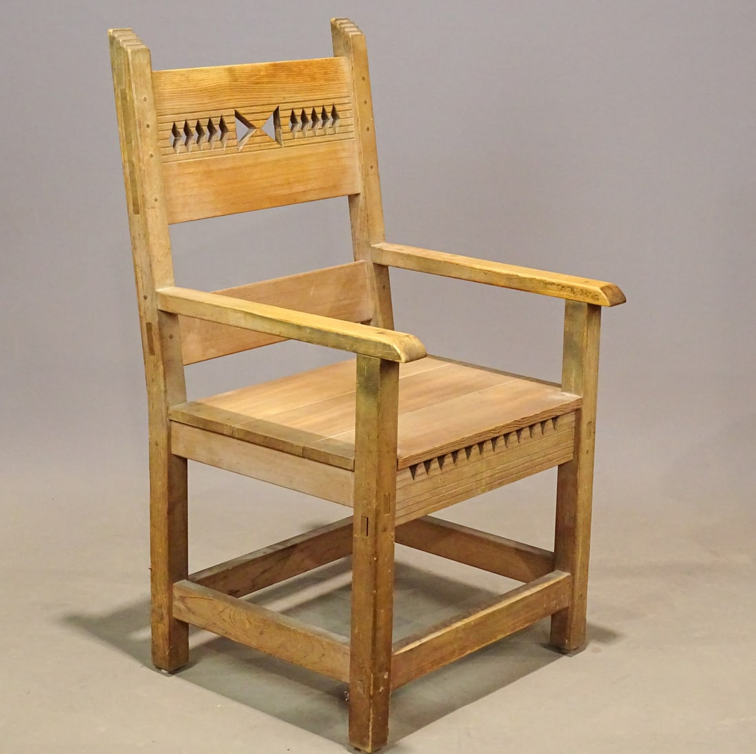 Southwestern Armchair: Southwestern-style armchair, signed "Taos Furniture". 39" Ht. 17 1/2" seat Ht.