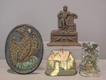 Misc. Lot: Lot including cast iron fire marker (11" x 9"), (3) cast iron doorstops (largest 7 1/2" W., 9 1/2" Ht.).