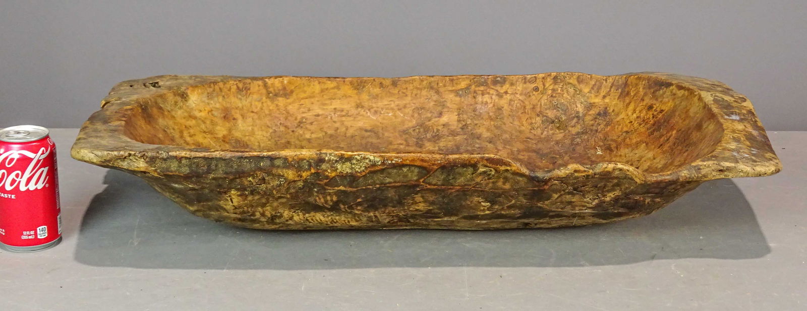 Carved Wooden Bowl: 19th c. carved wooden bowl. 29" x 16" x 5" Ht..