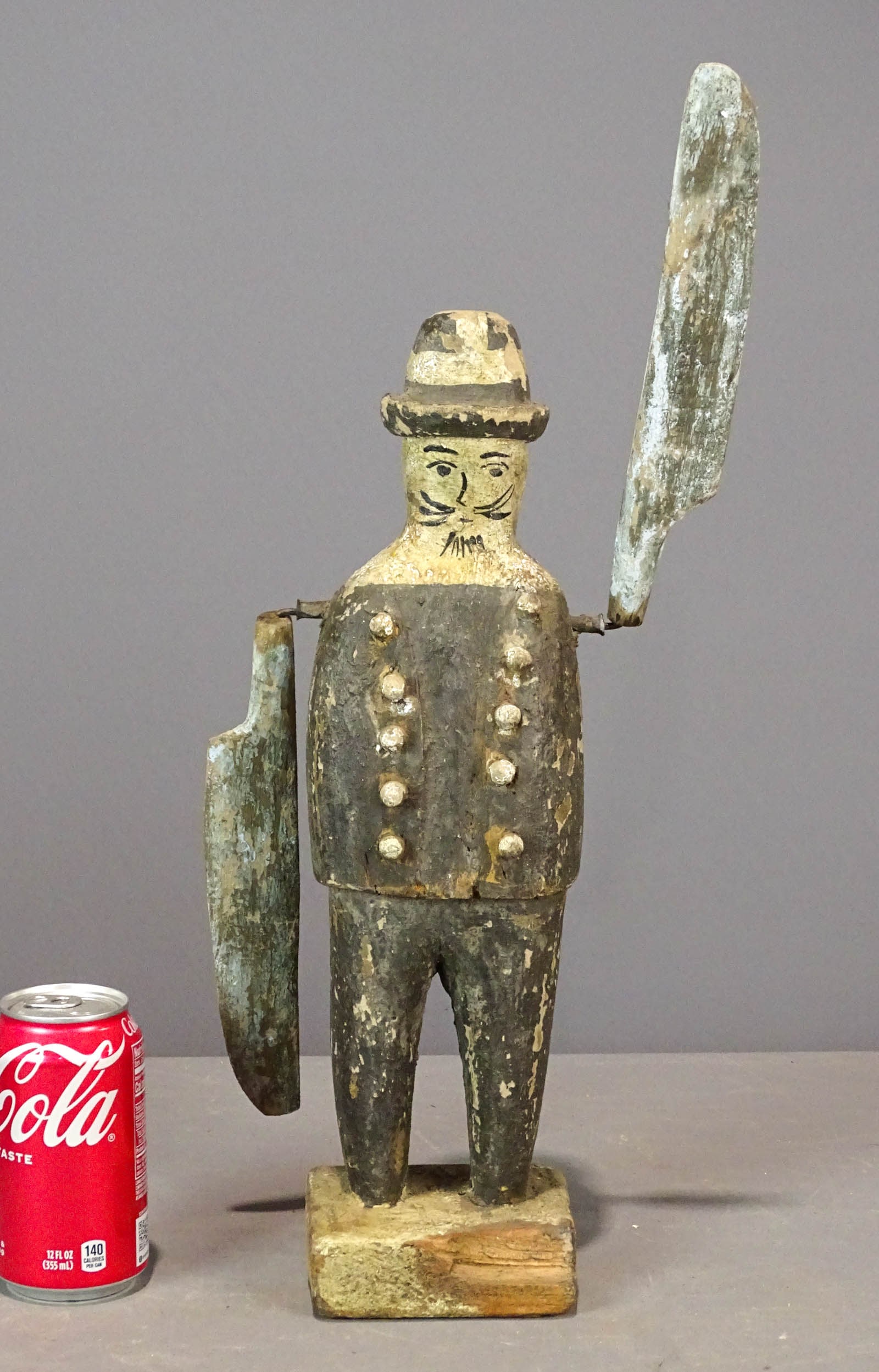 Folk Art Whiligig: Folk art carved wooden Policeman whirligig. 8" x 5" x 19" Ht..