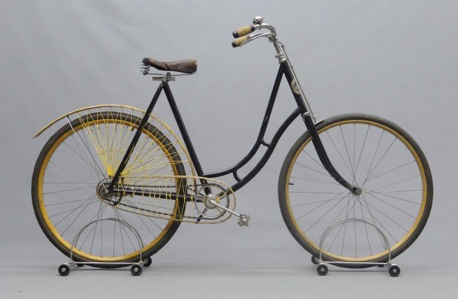 Columbia Model 46 Pneumatic Bicycle: C. 1897 Columbia Lady's Model 46 Pneumatic, with bell, rideable, saddle torn. Older restoration. Good condition. Pedaling History Museum Collection.