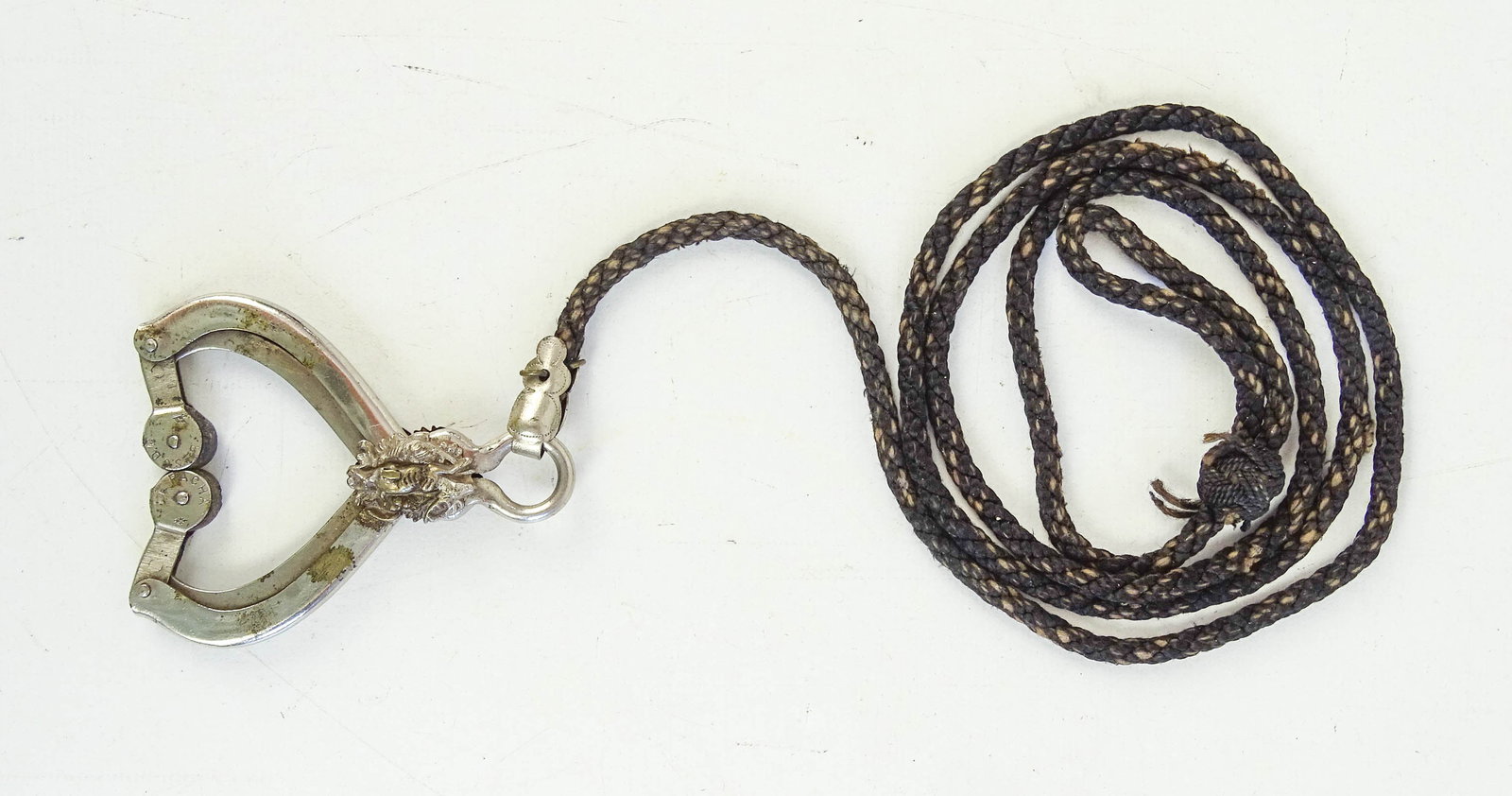 Skirt Lifter: Victorian skirt lifter. Marked "Le Pacha". 4 1/2" L.. Good condition. Dave Walker Collection.