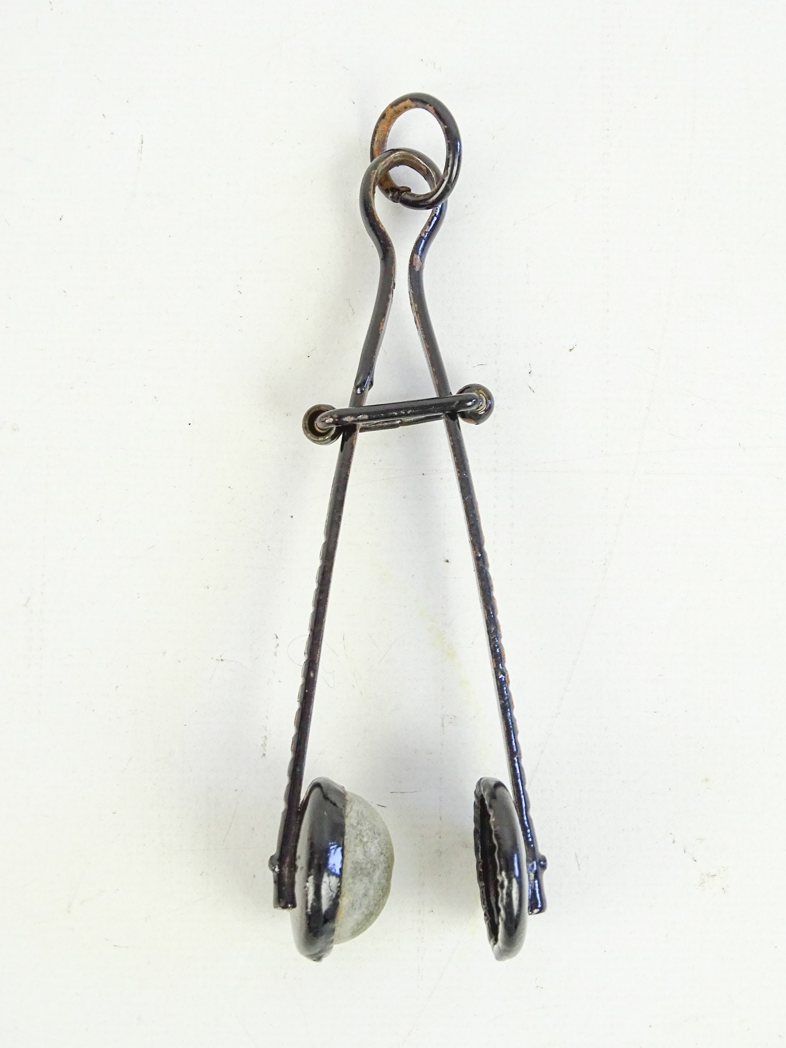Skirt Lifter: Victorian skirt lifter. Good condition. 5" L.. Dave Walker Collection.