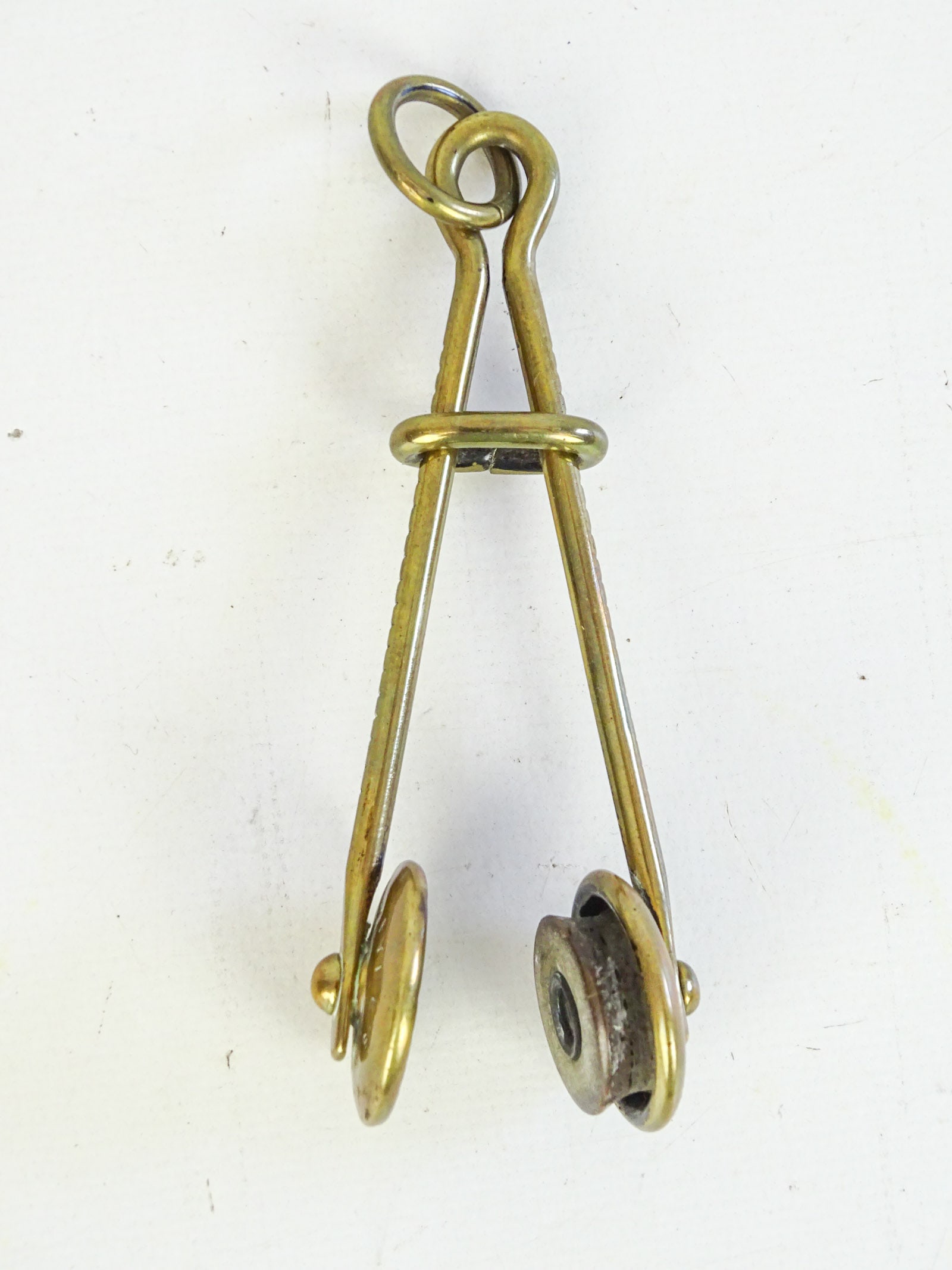 Victorian Skirt Lifter: Victorian brass skirt lifter. Marked Fyfe's Patent 1876. Good condition. Dave Walker Collection.