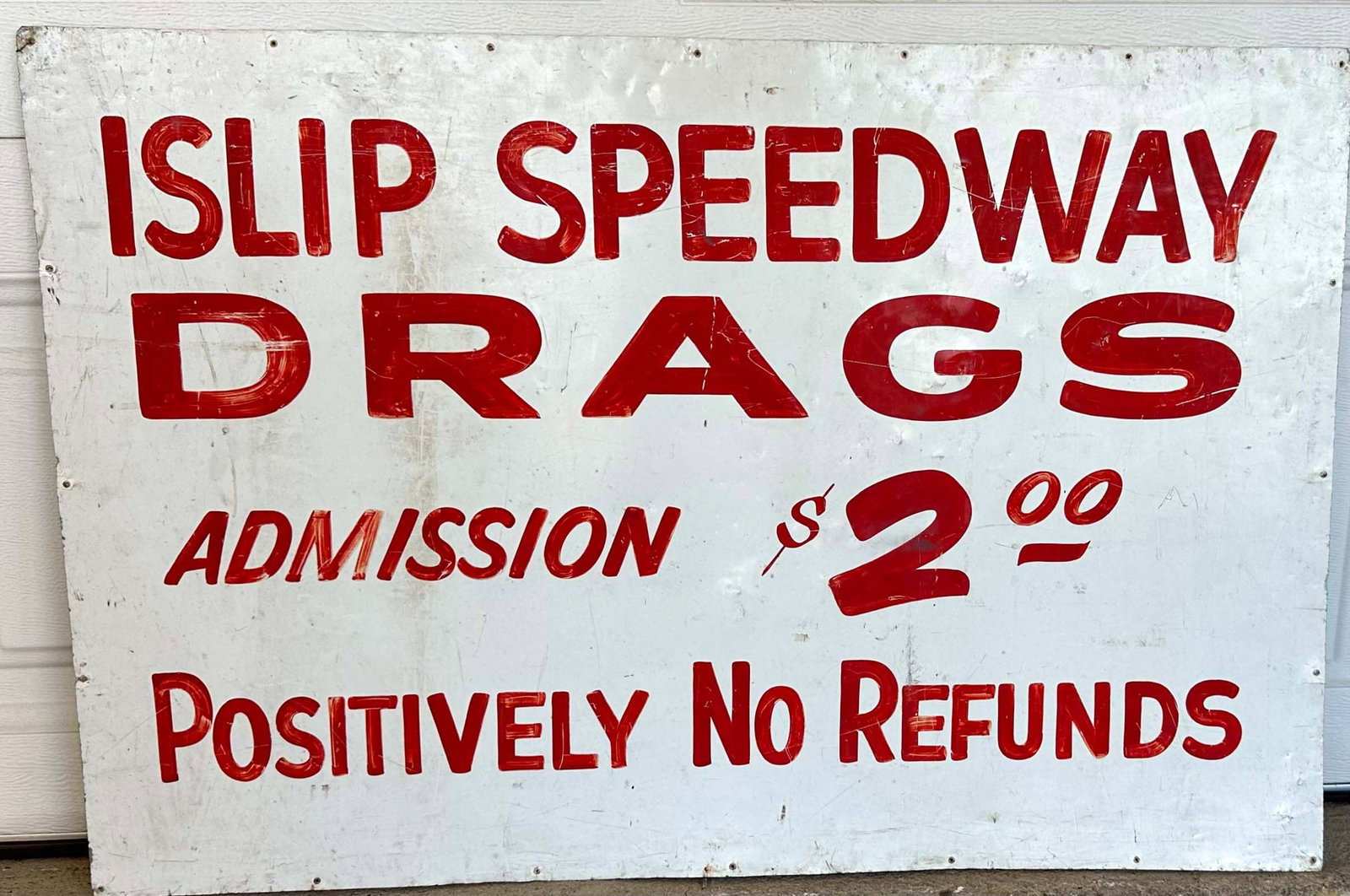 Islip Drags: Islip Drags, $2.00, tin painted, single sided, 36 x 24, condition as shown. Marty Himes Racing Museum Collection Bay Shore New York.