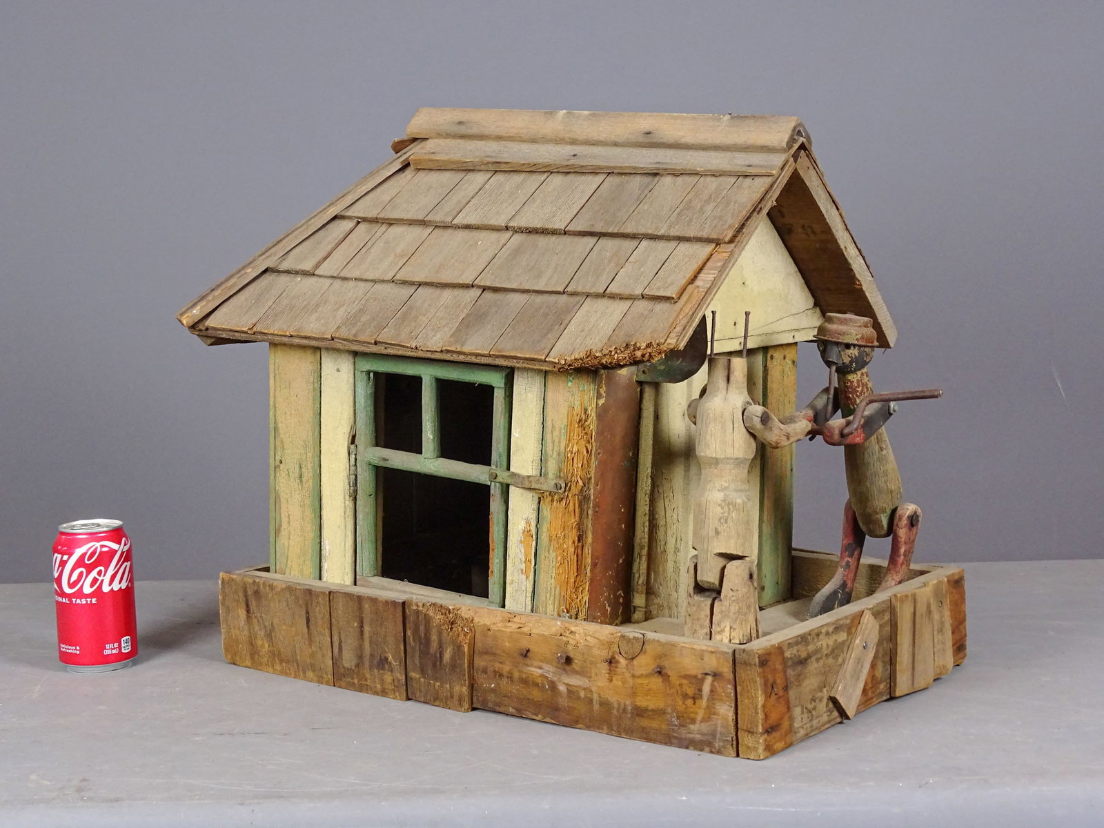 Folk Art Birdhouse: Folk art whirligig birdhouse. 21" x 13 1/2" x 18" Ht..