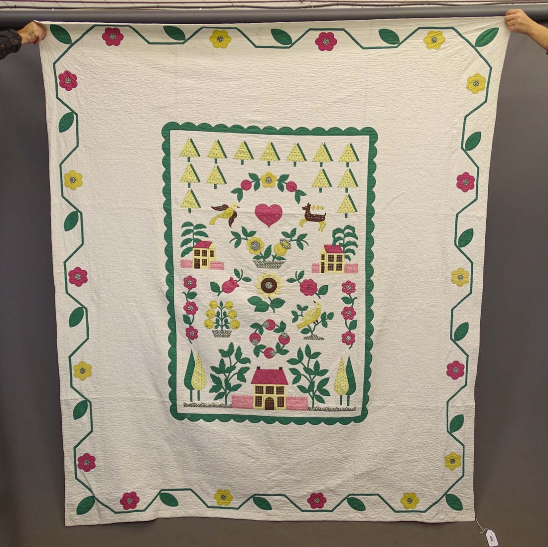 C. 1940's Applique Quilt: C. 1940's applique quilt with house, birds, florals. 76" x 84".