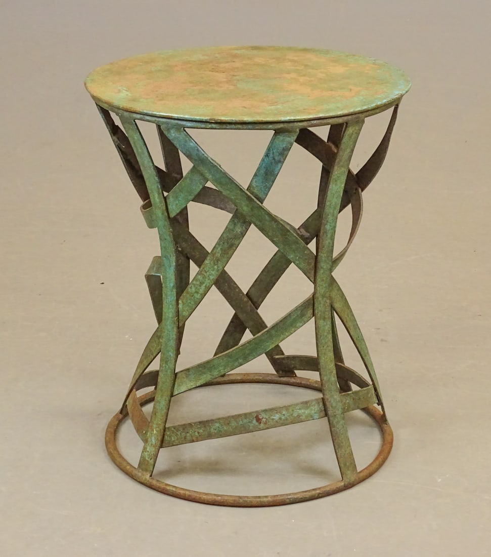 Garden room iron table: Wrought iron garden room table in old green paint. 14" D., 19" Ht..