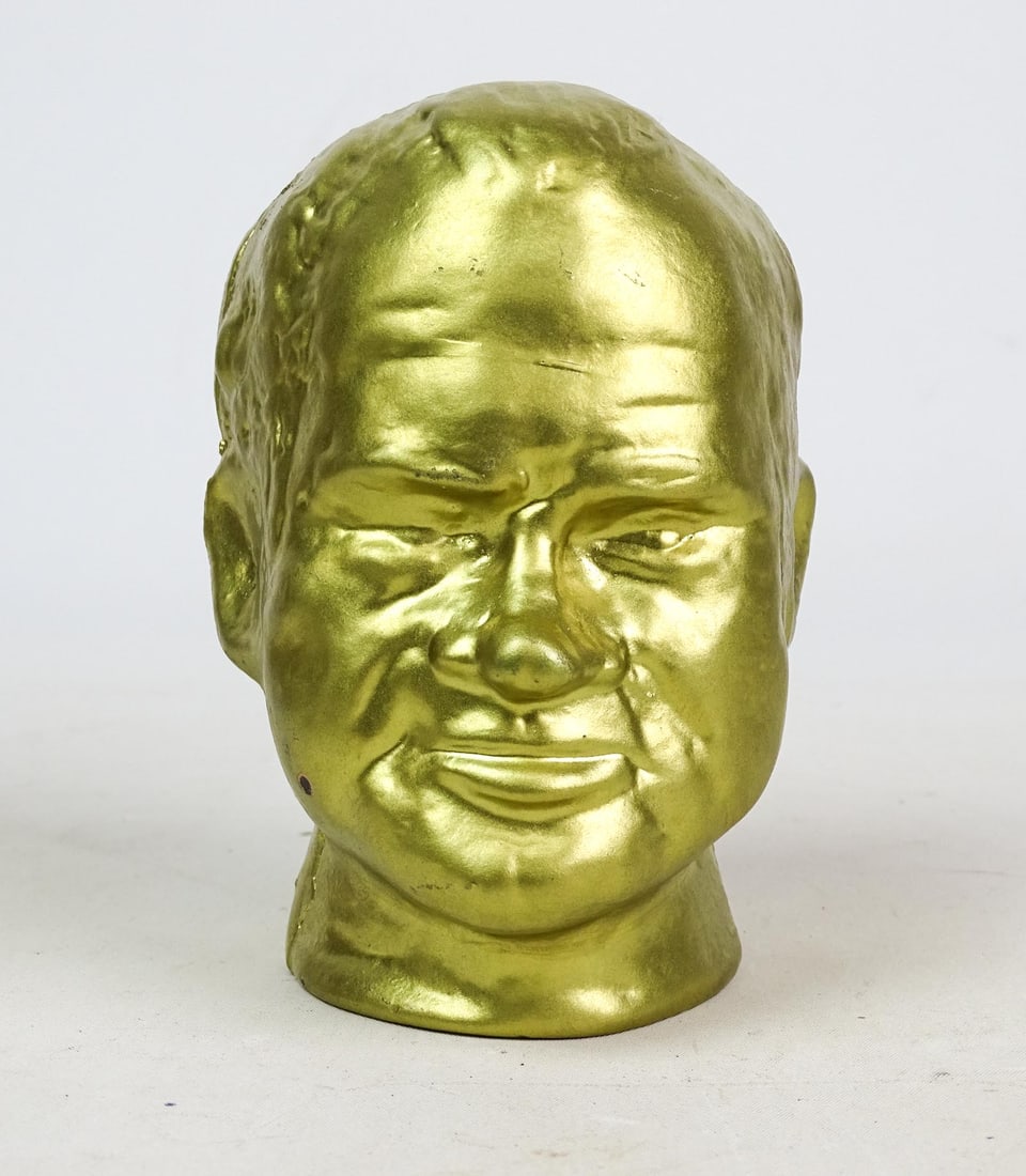 Still Bank: Cast iron still bank, Nixon Bust. 5 5/16" Ht.. MFG. Charlotte Blevins. Please note items must be removed/picked up/shipped within 2 weeks after the auction.