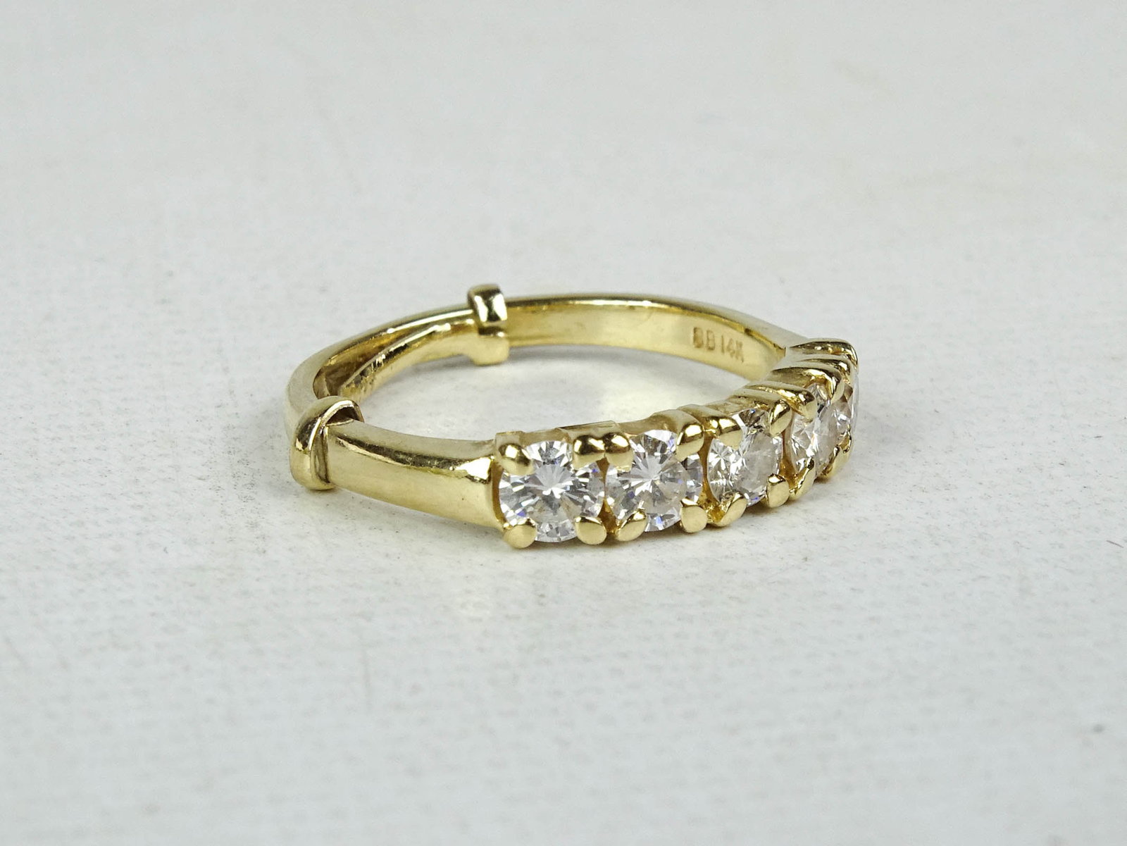 Diamond Ring: Diamond ring with yellow gold. Appraised for $2050.00. Size 7. Please note items must be removed/picked up/shipped within 2 weeks after the auction.