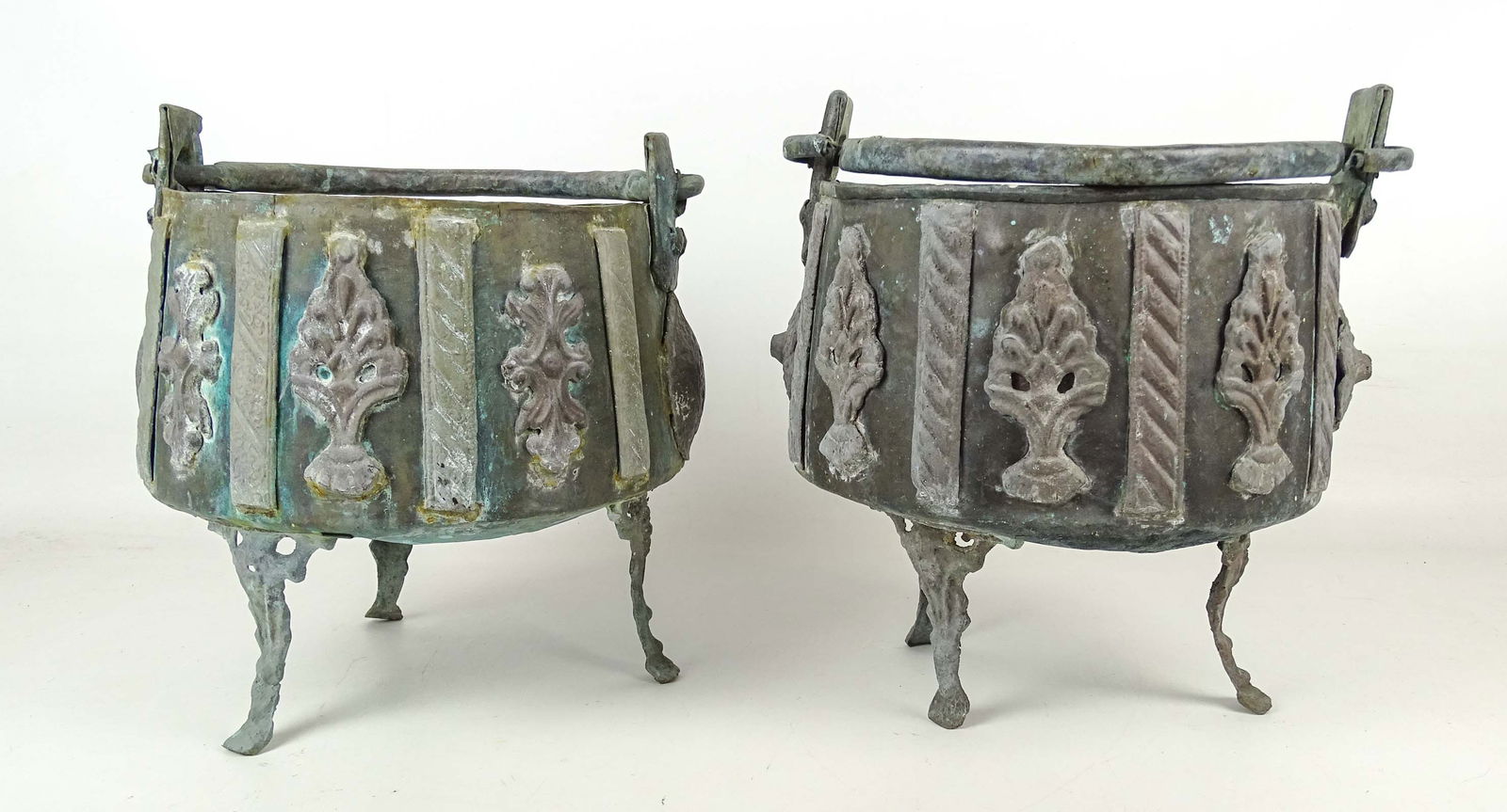 Copper Planters: Pair of early swing handle tri-foot copper planters. 10" D., 11" Ht..