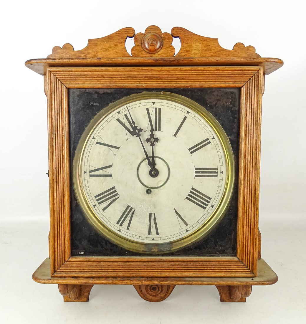 Ingraham Wall Clock: Oak wall clock, E. Ingraham Co., Bristol Conn. 24" Ht.