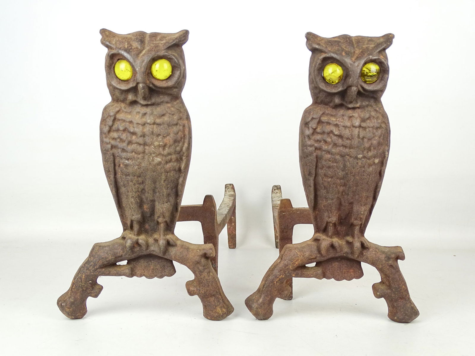 Pair Vintage Owl Andirons: Pair vintage cast iron Owl andirons. Glass eyes. 13" Ht., 18" D..