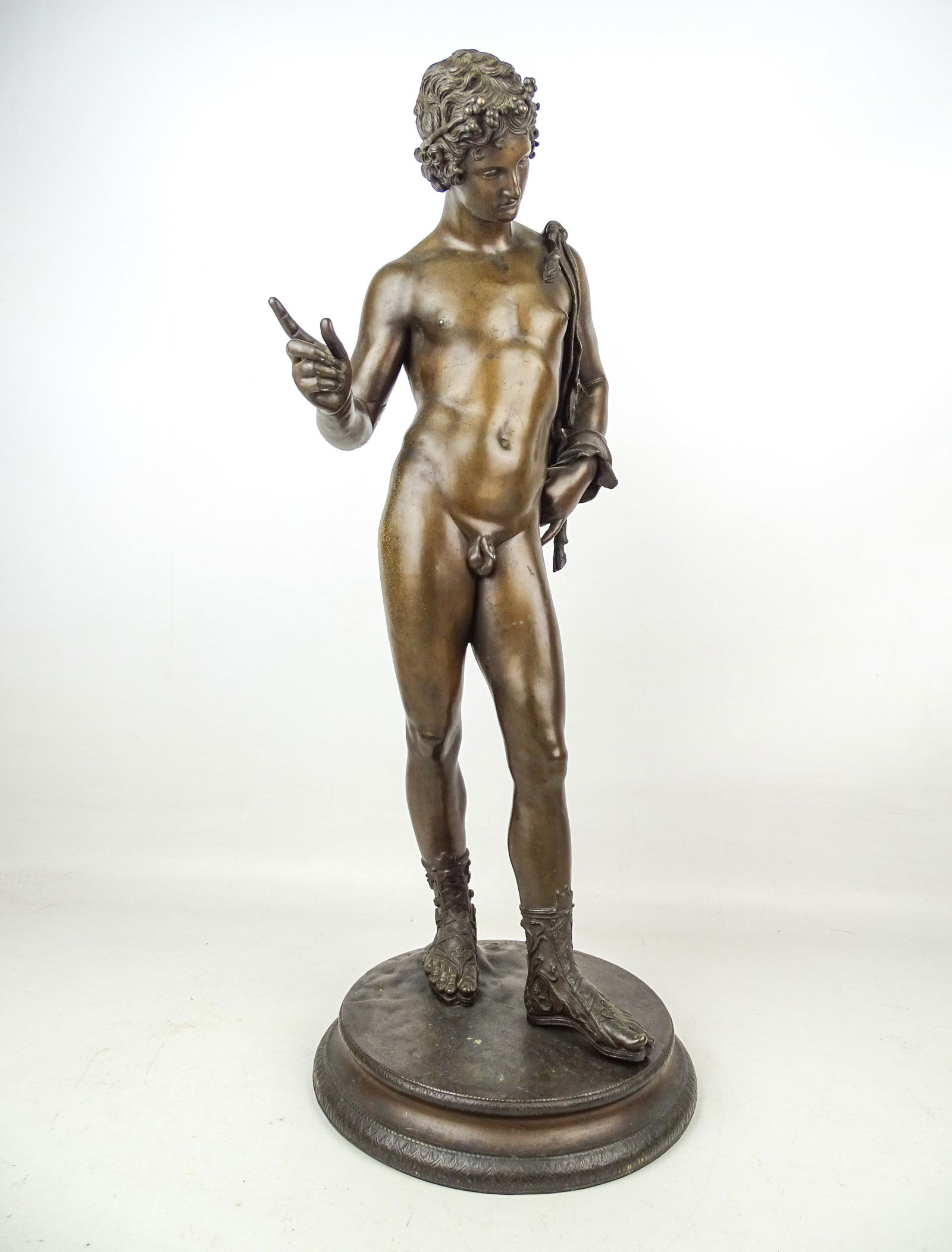 19th c. Bronze of Dionysus: 19th c. bronze of Dionysus commonly referred to as Narcissus. Has foundry mark on back of platform. Also marked 183. 25 1/2" Ht..