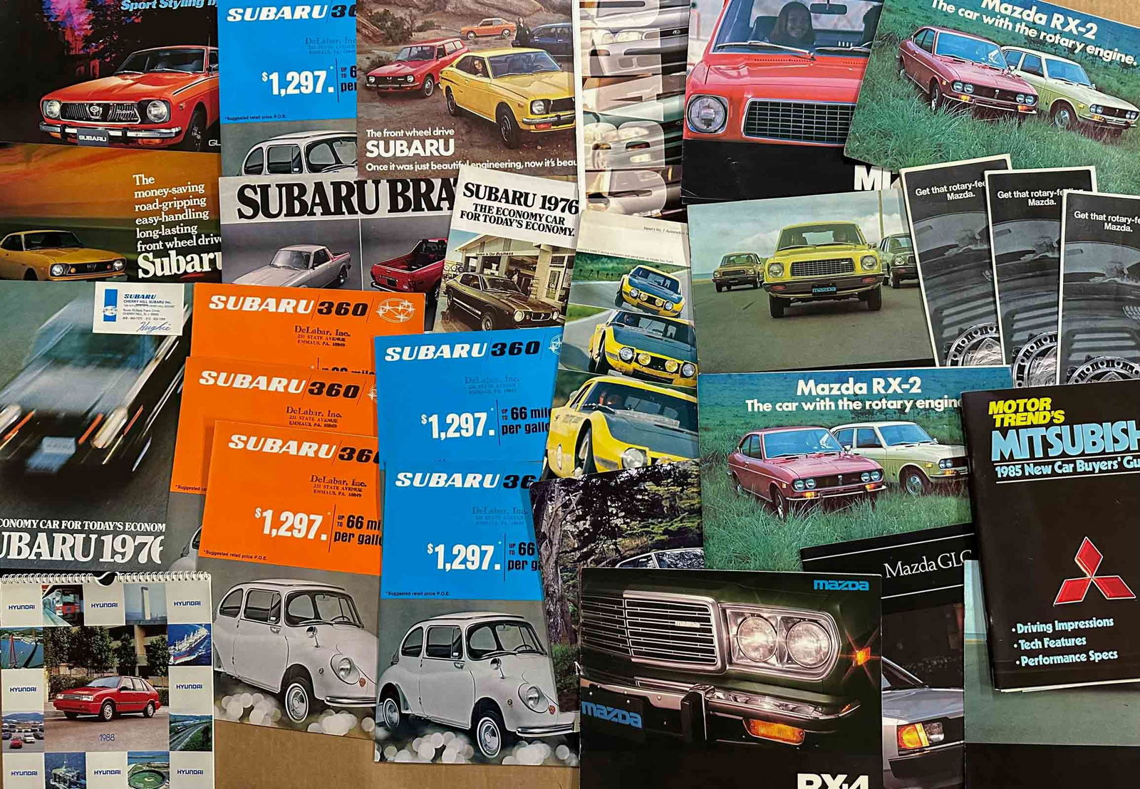 Japanese Car Brochures: Japanese car brochures 1960's - 1980's, Honda, Subaru, Toyota, Madza, etc, 100 (+) items.