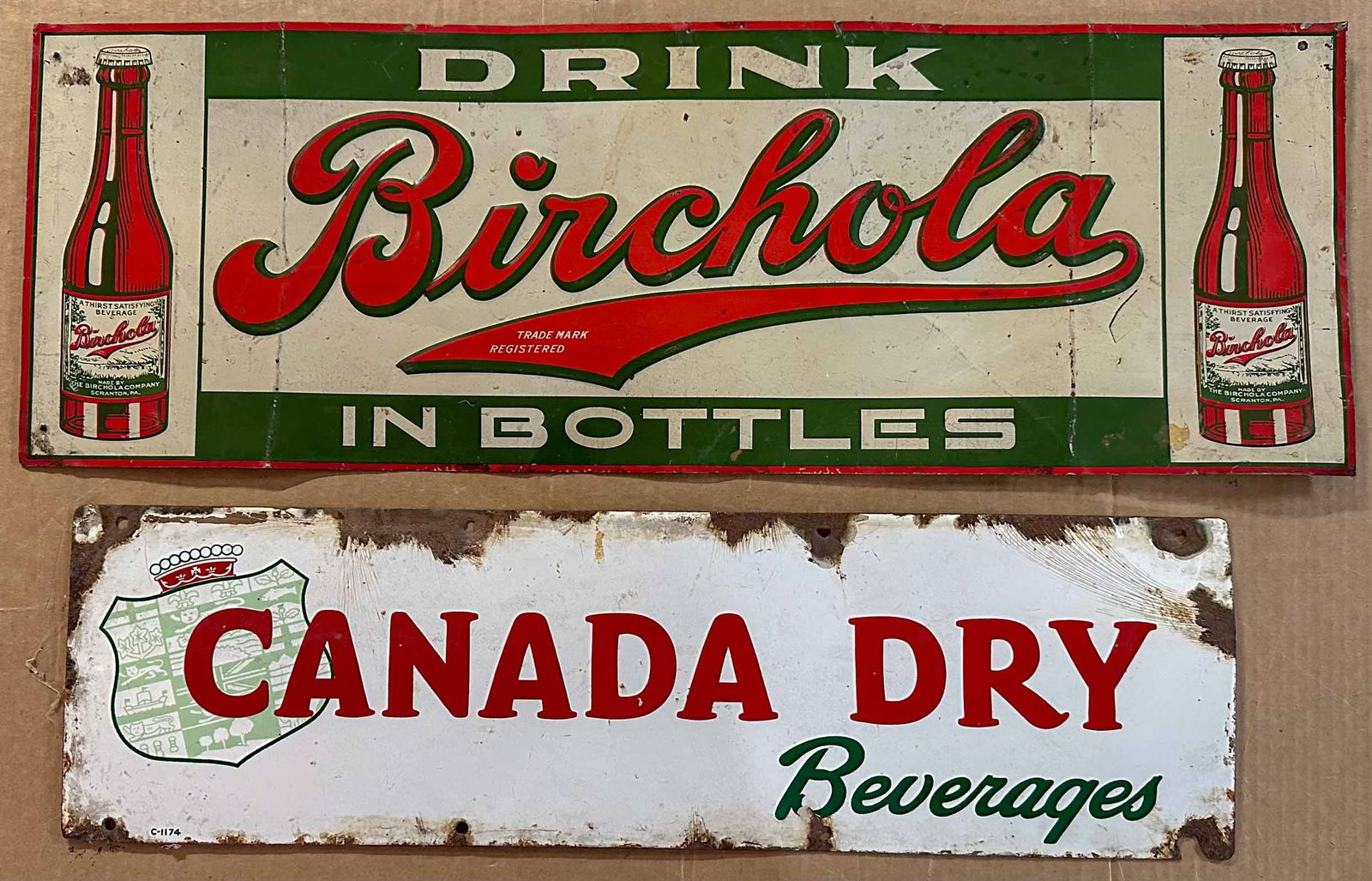 Two Soda Signs: Two soda signs, Birchola tin embossed, 28 x 9, Canada Dry porcelain, 24 x 7. Meltz Collection, Columbia County New York.