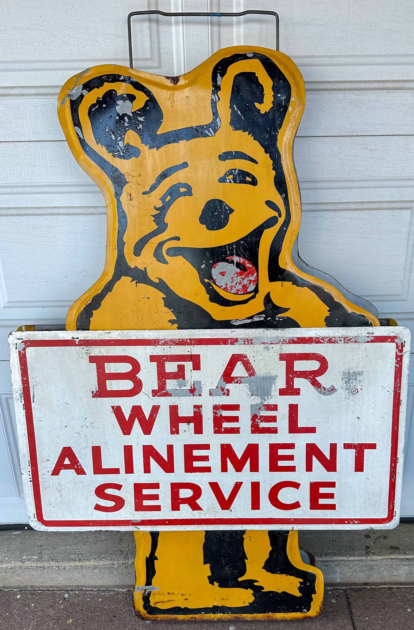 Bear Wheel Alignment Sign: Bear Wheel Alignment sign, painted, double sided, spacer between faces, 57 high, 36 wide, 3.5 inches thick. Meltz Collection, Columbia County New York.