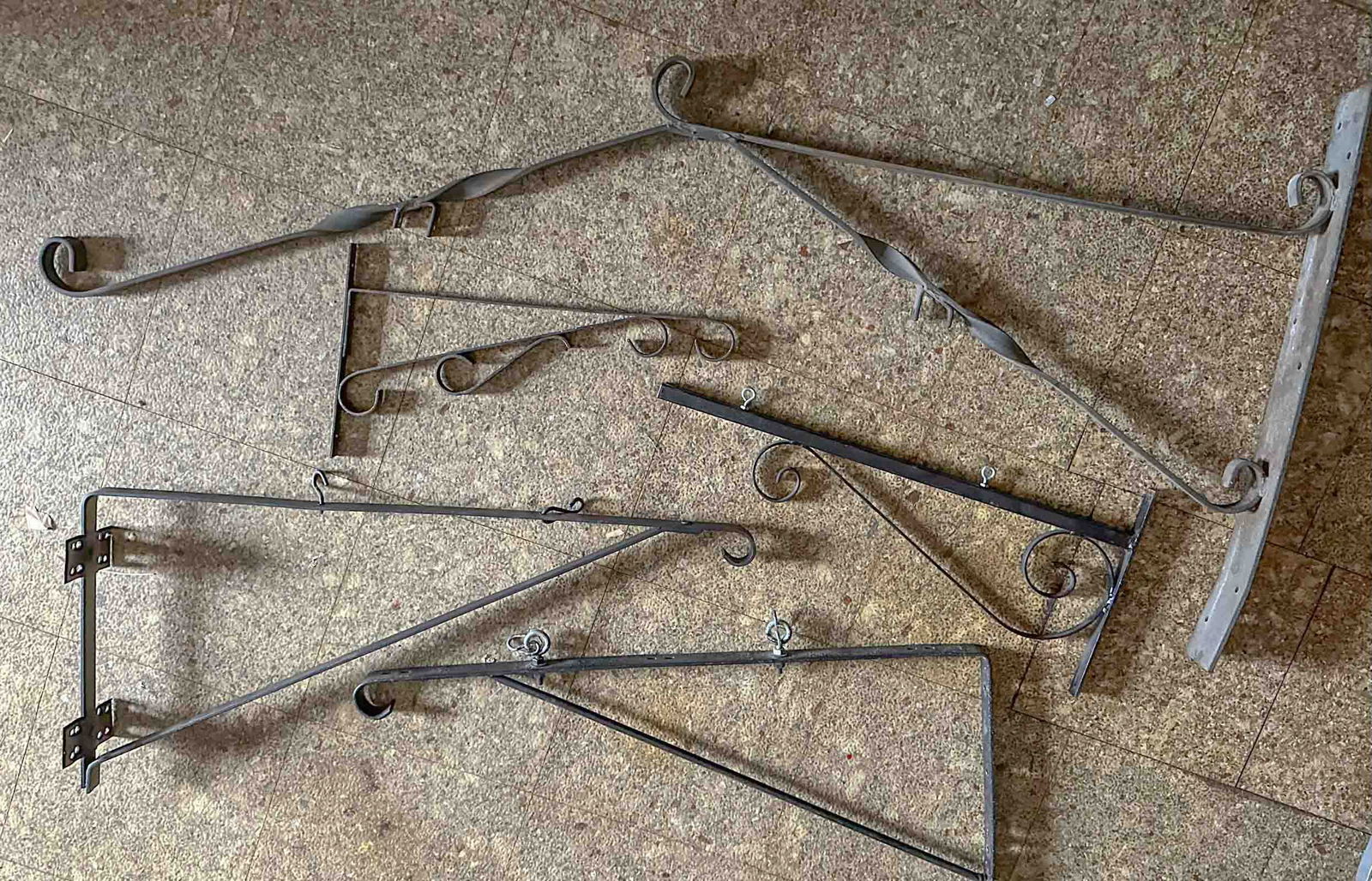 Five Brochures: Five sign wall hanging brackets ranging from 18 to 54 inches long. Meltz Collection, Columbia County New York.