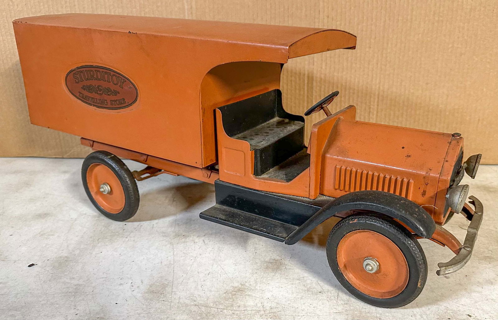 Sturditoy Truck: Ca 1929 Sturditoy Traveling Store truck, original paint and decals, original food packages not included, 24 inches long. Meltz Collection, Columbia County New York.
