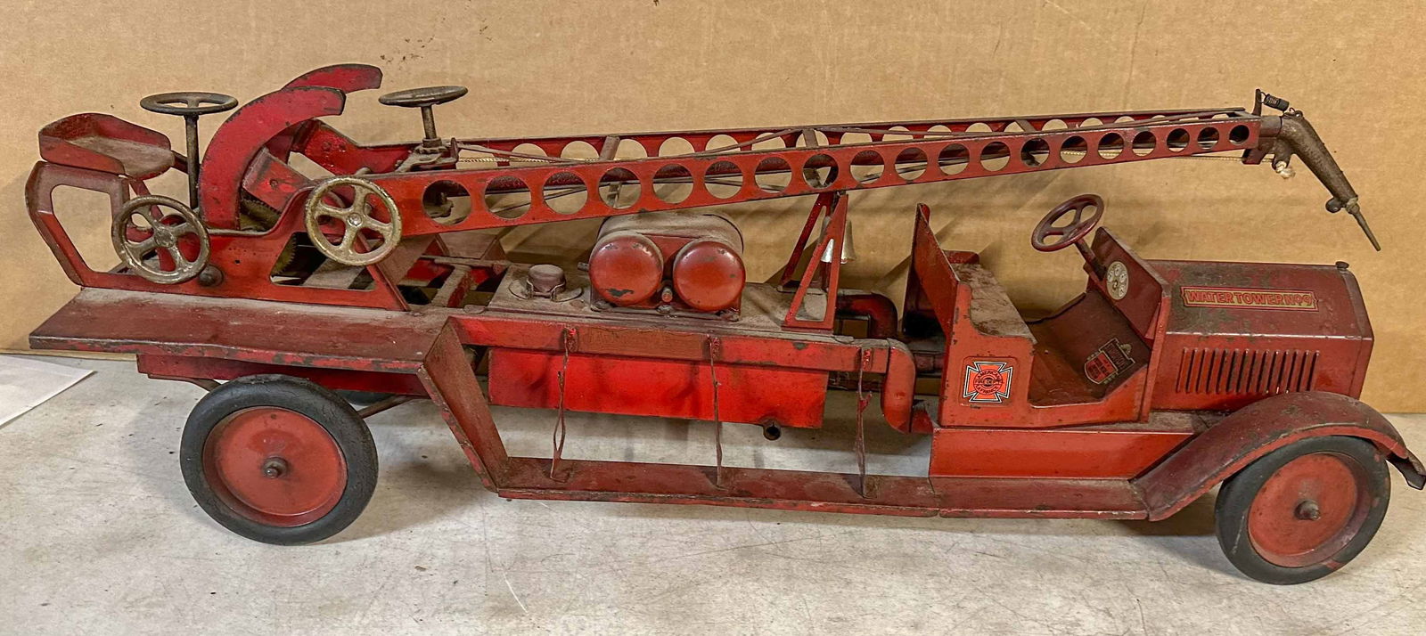 Sturditoy Truck: Ca 1927 Sturditoy water tower fire truck, 32 inches long, original paint and decals. Meltz Collection, Columbia County New York.