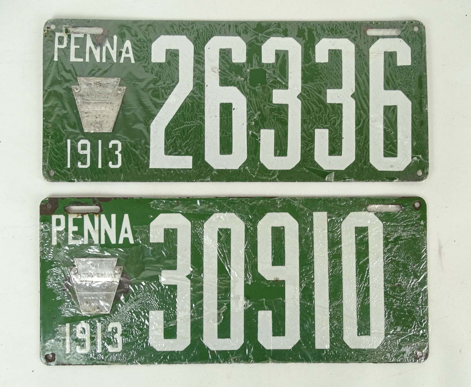 Auto License Plates, 1913: Pair of 1913 porcelain auto license plates, "Penna 30910". 6" x 14".