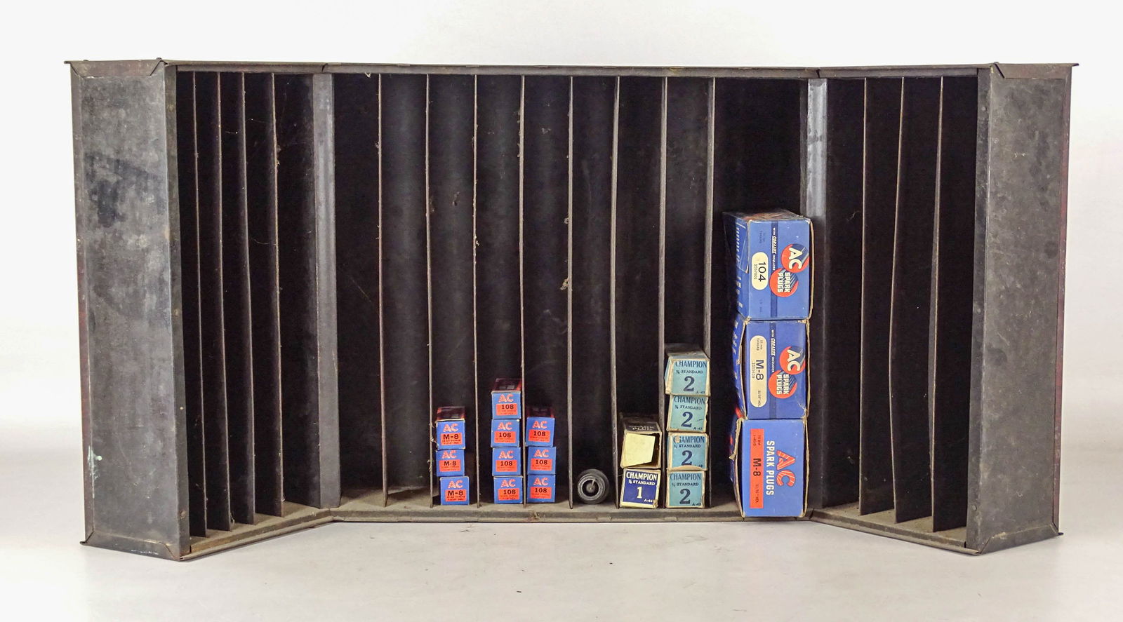 Champion Spark Plug Cabinet: Metal Champion Spark plug cabinet. 29" x 9" x 14 1/2" Ht. Meltz Collection, Columbia County New York.