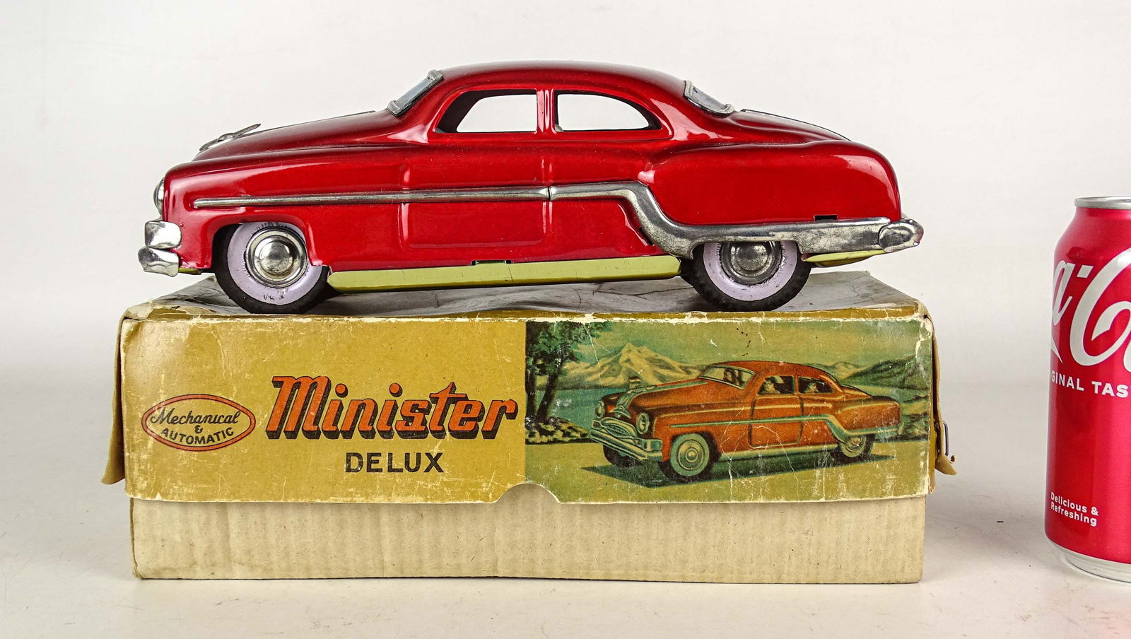 Minister Delux Toy Car: Boxed "Minister Delux" toy car. Box overall 10" x 4" x 4"). Meltz Collection, Columbia County New York.