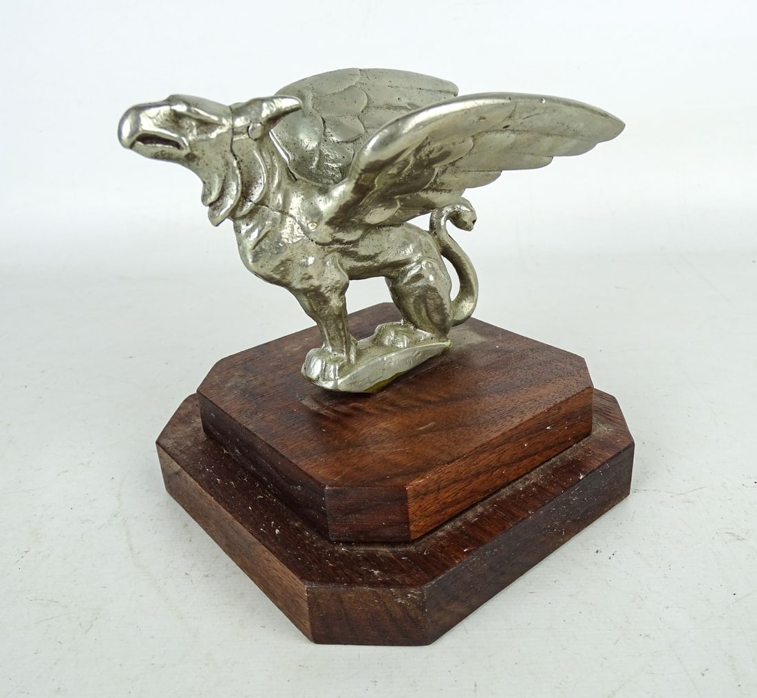 Gardner Hood Mascot: Gardner Griffin mascot on base, C. 1925. 5" Ht.
